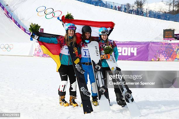 Gold medalist Julia Dujmovits of Austria celebrates with silver medalist Anke Karstens of Germany and bronze medalist Amelie Kober of Germany during...