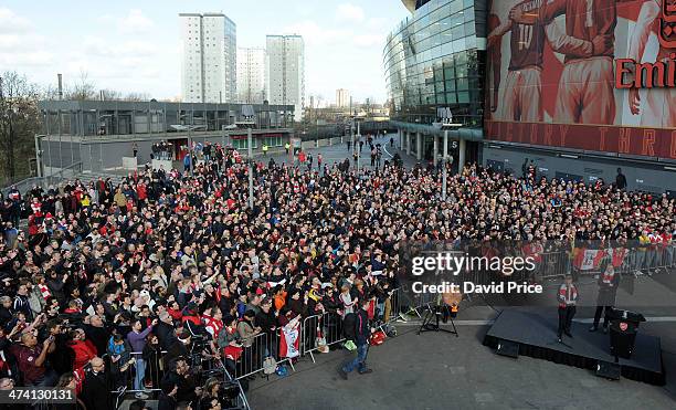 Arsenal Legend Dennis Bergkamp and Arsenal director Ken Friar unveil a statue outside the stadium in Bergkamp's honour before the match between...