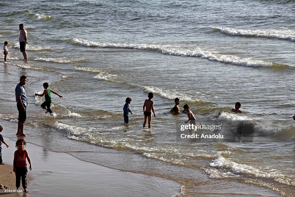 People enjoy a sunny day in Gaza