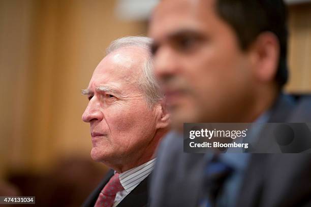 Xavier Huillard, chief executive officer of Vinci SA, listens during a panel discussion at the Business Climate Summit in Paris, France, on...