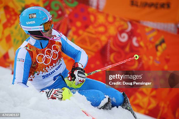 Patrick Thaler of Italy crashes out in the first run during the Men's Slalom during day 15 of the Sochi 2014 Winter Olympics at Rosa Khutor Alpine...