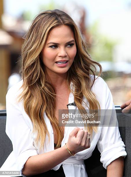 Model Chrissy Teigen visits "Extra" at Universal Studios Hollywood on May 20, 2015 in Universal City, California.