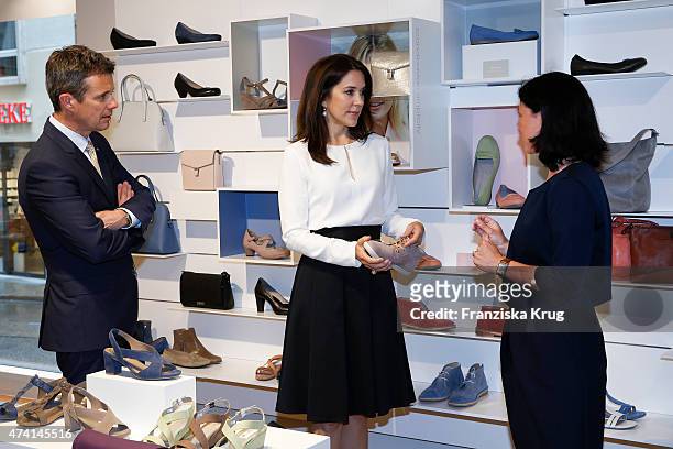 Crown Prince Frederik, Crown Princess Mary of Denmark and Nadina Pellegrino during the ECCO store opening on May 20, 2015 in Munich, Germany.