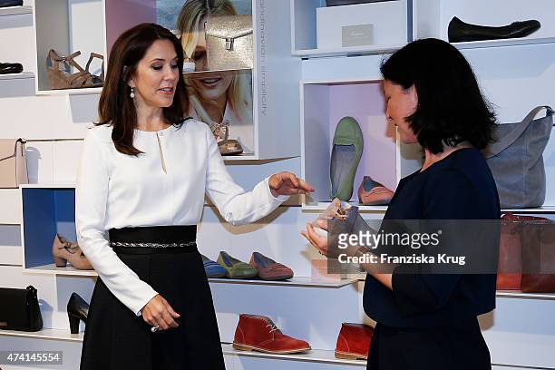 Crown Princess Mary of Denmark and Nadina Pellegrino during the ECCO store opening on May 20, 2015 in Munich, Germany.