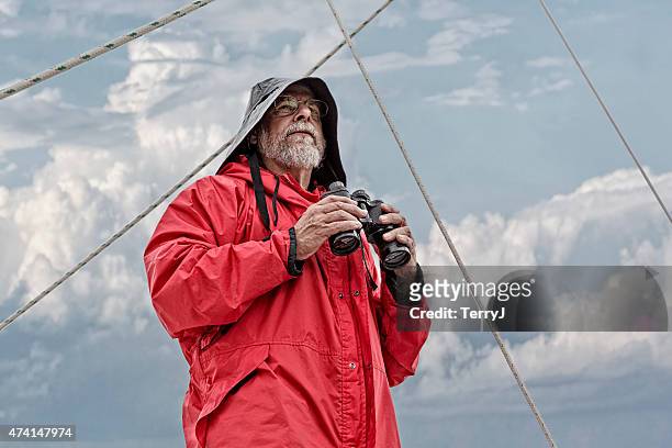 old man and the sea looking out - boat captain stockfoto's en -beelden