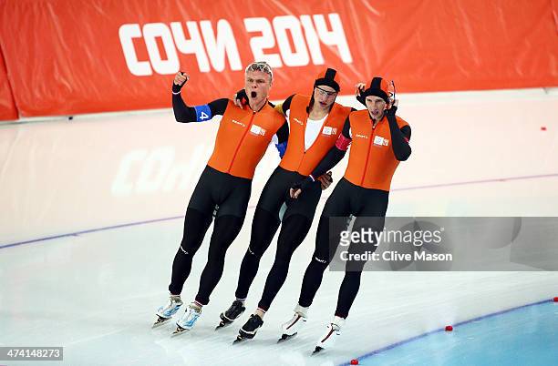 Koen Verweij, Sven Kramer and Jan Blokhuijsen of the Netherland celebrate winning the gold medal during the Men's Team Pursuit Final A Speed Skating...