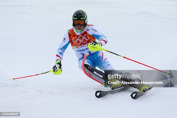 Reinfried Herbst of Austria in action during the Men's Slalom during day 15 of the Sochi 2014 Winter Olympics at Rosa Khutor Alpine Center on...
