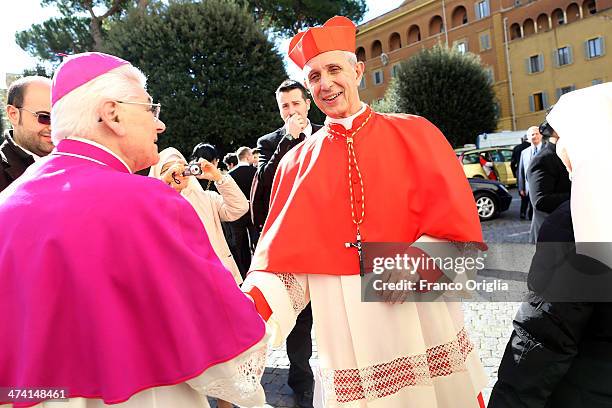 New Cardinal Mario Aurelio Poli, archbishop of Buenos Aires, receives congratulations as he leaves St Peter's Basilica after attending the Consistory...