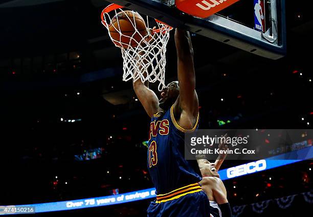 Tristan Thompson of the Cleveland Cavaliers goes up against Kyle Korver of the Atlanta Hawks in the first quarter during Game One of the Eastern...