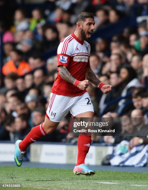 Ashkan Dejagah of Fulham celebrates scoring the opening goal during the Barclays Premier League match between West Bromwich Albion and Fulham at The...
