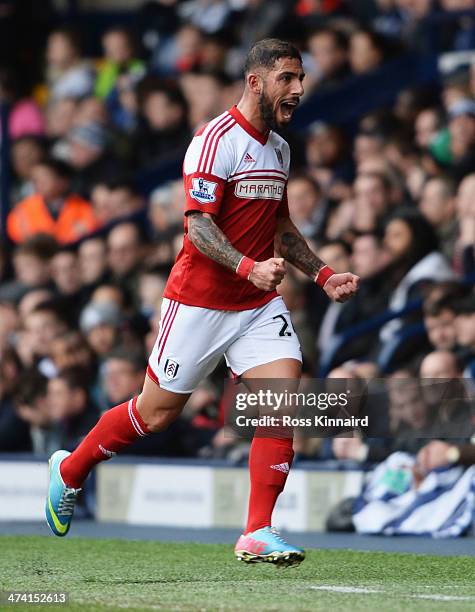 Ashkan Dejagah of Fulham celebrates as he scores their first goal during the Barclays Premier League match between West Bromwich Albion and Fulham at...