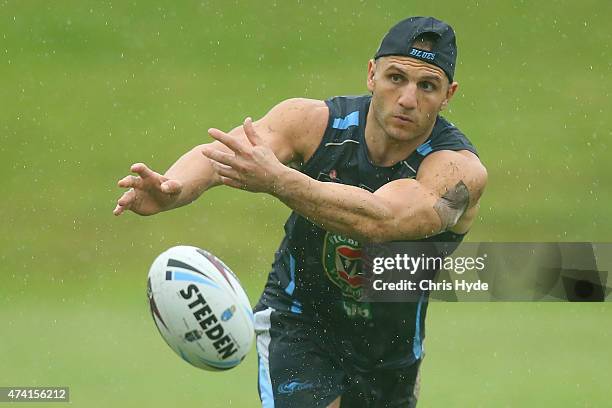 Robbie Farah passes while wearing a bio patch during a New South Wales Blues State of Origin training session at Novotel Coffs Harbour on May 21,...