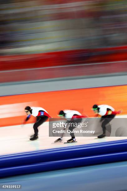 Denny Morrison, Mathieu Giroux and Lucas Makowsky of Canada compete during the Men's Team Pursuit Final B Speed Skating event on day fifteen of the...