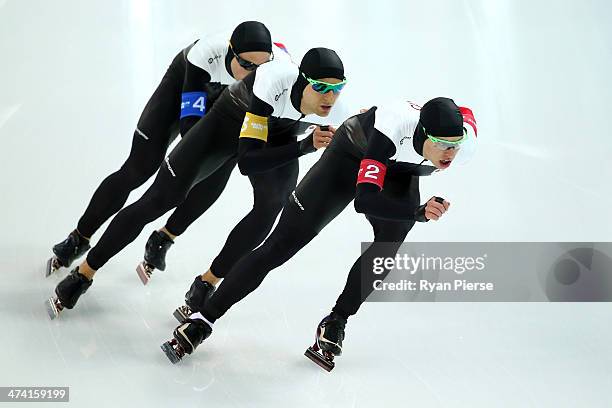 Denny Morrison, Lucas Makowsky and Mathieu Giroux of Canada compete during the Men's Team Pursuit Final B Speed Skating event on day fifteen of the...