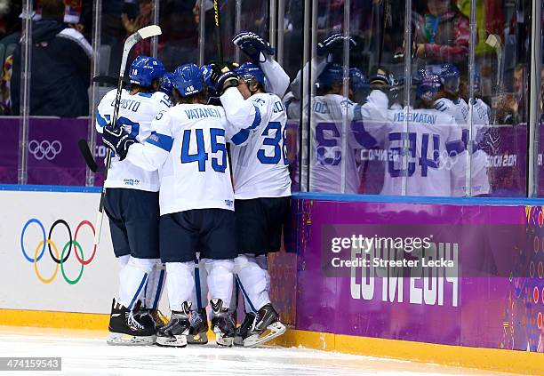 Jussi Jokinen of Finland celebrates his goal in the second period with Jori Lehtera, Petri Kontiola, Sami Lepisto and Sami Vatanen against the United...