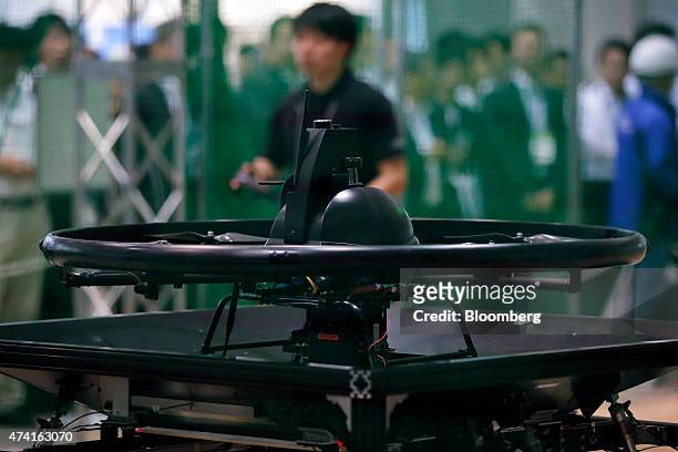 An Autonomous Control Systems Laboratory Ltd. Multi-rotor unmanned aerial vehicle sits during a demonstration at the International Drone Expo in...