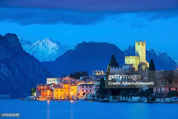 malcesine at night - malcesine stock pictures, royalty-free photos & images