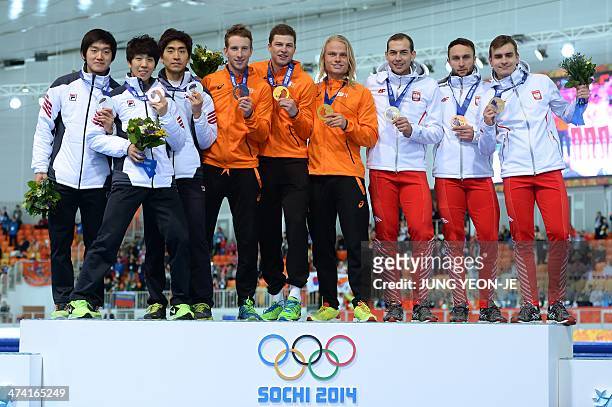South Korea's silver medalists Joo Hyong-Jun, Kim Cheol-Min and Lee Seung-Hoon, Netherlands' gold medalists Jan Blokhuijsen, Sven Kramer and Koen...