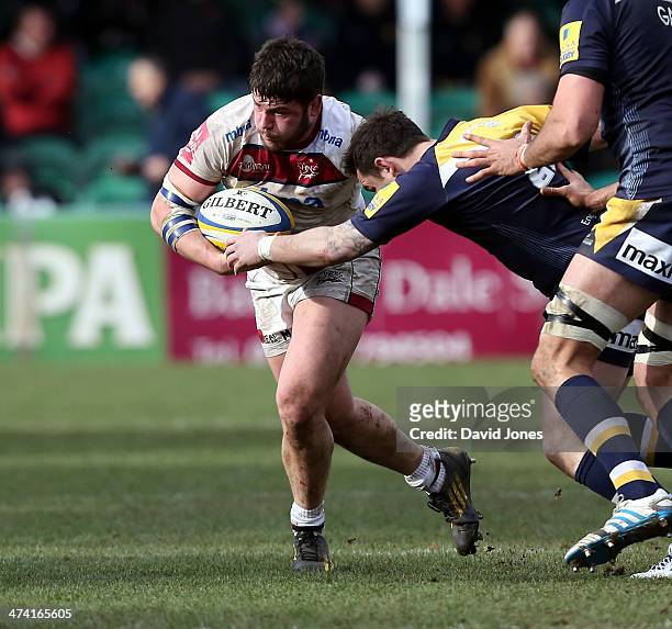 Marc Jones of Sale Sharks is tackled by Ryan Lamb of Worcester Warriors during the Aviva Premiership match between Worcester Warriors and Sale Sharks...