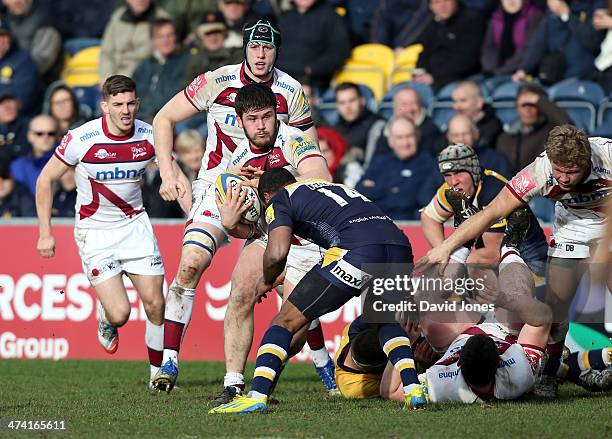 Marc Jones of Sale Sharks is tackled by Josh Drauniniu of Worcester Warriors during the Aviva Premiership match between Worcester Warriors and Sale...