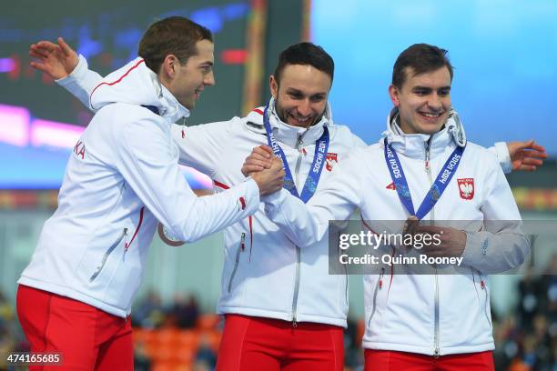Bronze medalists Poland celebrate during the medal ceremony for the Speed Skating Men's Team Pursuit on day fifteen of the Sochi 2014 Winter Olympics...