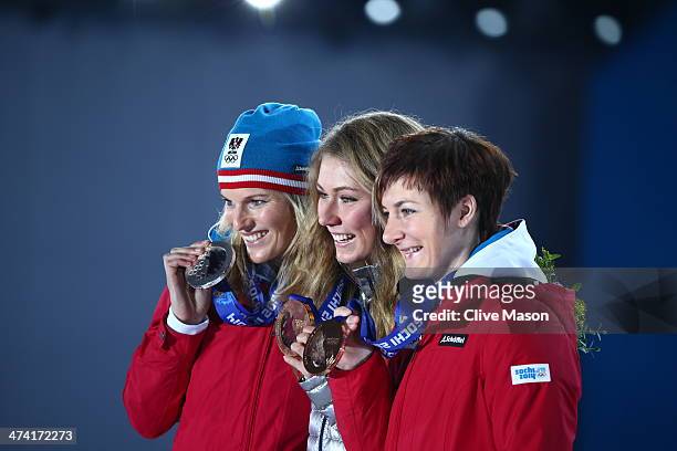 Silver medalist Marlies Schild of Austria, gold medalist Mikaela Shiffrin of the United States and bronze medalist Kathrin Zettel of Austria...