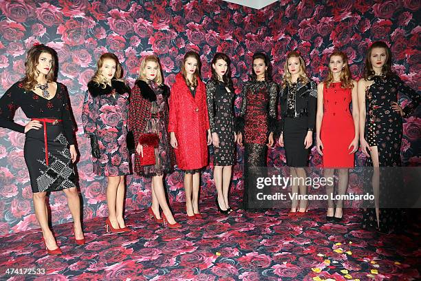 Models pose during the Maria Grazia Severi presentation as part of Milan Fashion Week Womenswear Autumn/Winter 2014 on February 22, 2014 in Milan,...