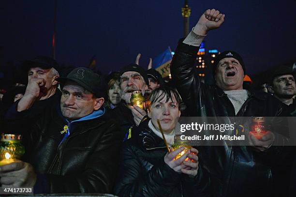 People react Independence square following the announcement that Ukrainian MPs voted to oust President Viktor Yanukovych on February 22, 2014 in...