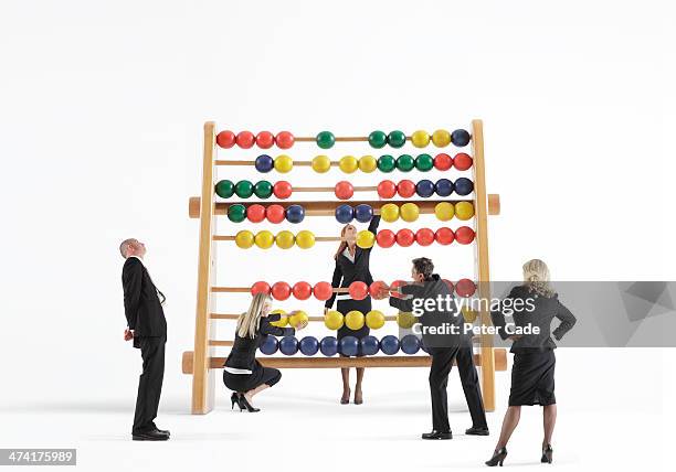 five executives with giant abacus - abacus old stock pictures, royalty-free photos & images