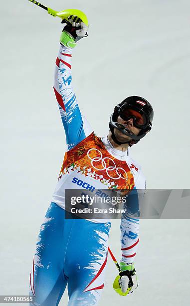 Mario Matt of Austria celebrates winning gold after finishing the second run during the Men's Slalom during day 15 of the Sochi 2014 Winter Olympics...