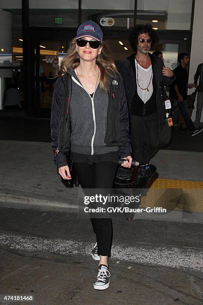 Renee Zellweger and Doyle Bramhall are seen at LAX on May 20, 2015 in Los Angeles, California.