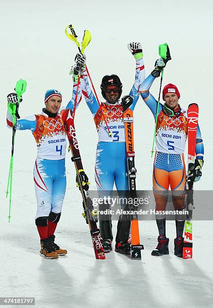 L-r: Silver medalist Marcel Hirscher of Austria, Gold medalist Mario Matt of Austria and bronze medalist Henrik Kristoffersen of Norway celebrate...