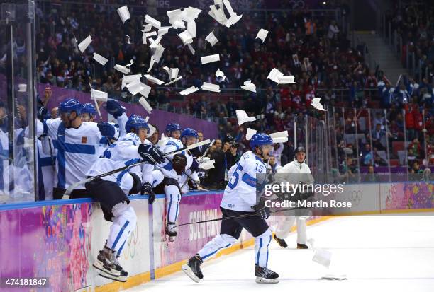 Sami Vatanen and Tuomo Ruutu of Finland celebrate with teammates after defeating the United States 5-0 during the Men's Ice Hockey Bronze Medal Game...