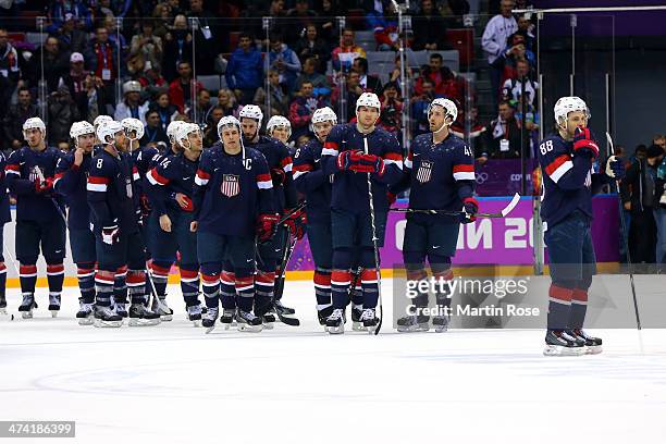 The United States look on after losing to Finland 5-0 during the Men's Ice Hockey Bronze Medal Game on Day 15 of the 2014 Sochi Winter Olympics at...