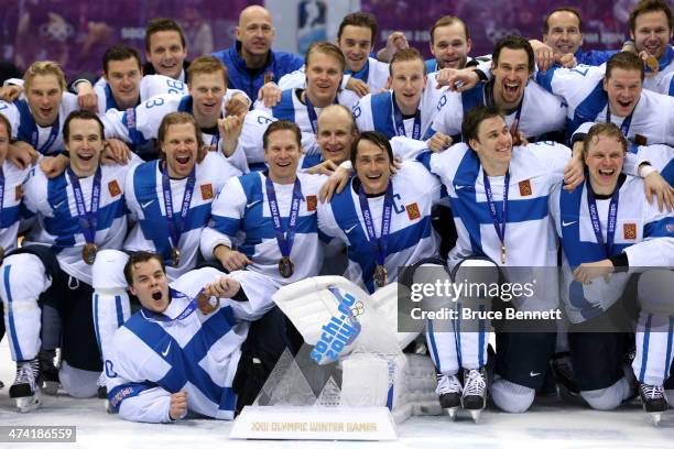 Bronze medalists Finland celebrate after defeating the United States 5-0 during the Men's Ice Hockey Bronze Medal Game on Day 15 of the 2014 Sochi...