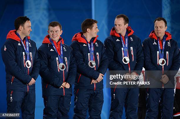 Great Britain's silver medallists Tom Jr Brewster, Michael Goodfellow, Scott Andrews, Greg Drummond and David Murdochthe celebrate during the Men's...