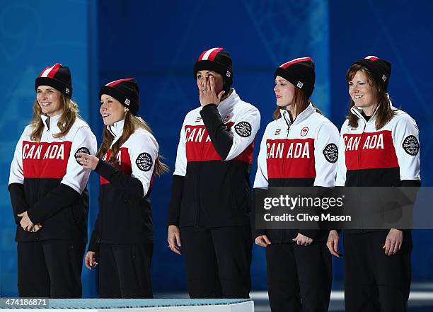 Gold medalists Jennifer Jones, Kaitlyn Lawes, Jill Officer, Dawn McEwen and Kirsten Wall of Canada celebrate during the medal ceremony for Women's...