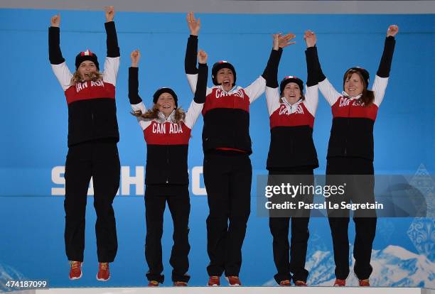 Gold medalists Jennifer Jones, Kaitlyn Lawes, Jill Officer, Dawn McEwen and Kirsten Wall of Canada celebrate during the medal ceremony for Women's...