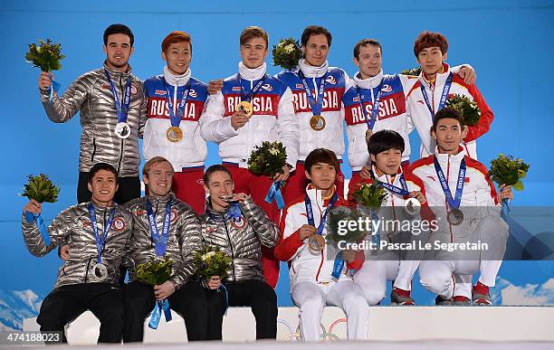 Silver medalists the United States, gold medalists Russia and bronze medalists China celebrate on the podium during the medal ceremony for the Men's...