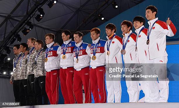 Silver medalists the United States, gold medalists Russia and bronze medalists China celebrate on the podium during the medal ceremony for the Men's...