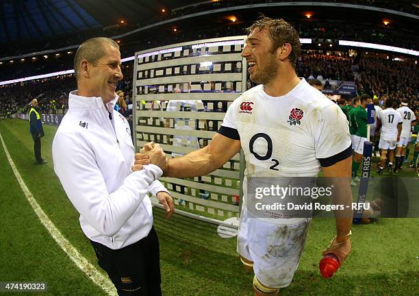 England head coach Stuart Lancaster shakes hand with Captain Chris Robshaw of England after victory during the RBS Six Nations match between England...