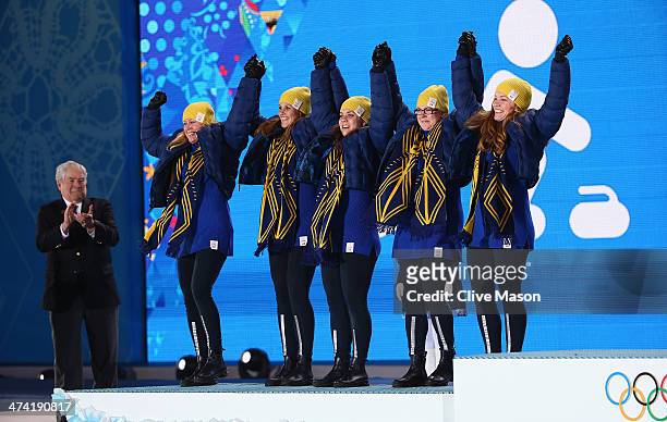 Silver medalists Maria Prytz, Christina Bertrup, Maria Wennerstrom, Margaretha Sigfridsson and Agnes Knochenhauer of Sweden celebrate during the...