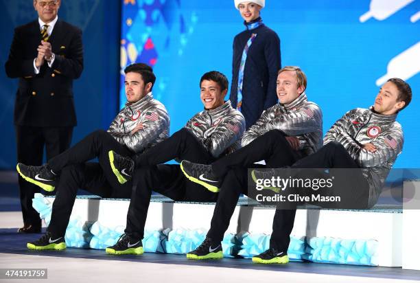 Silver medalists Eduardo Alvarez, JR Celski, Christopher Creveling and Jordan Malone of the United States celebrate on the podium during the medal...