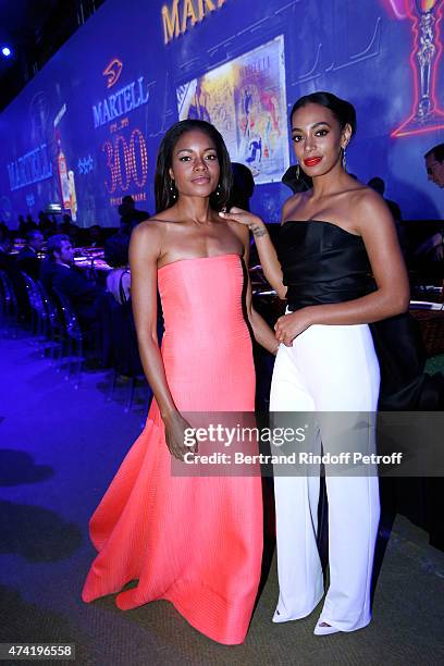 Actresses Naomie Harris and Solange Knowles enjoy a Martell cocktail at the Martell 300th anniversary event, held at the Palace of Versailles on May...