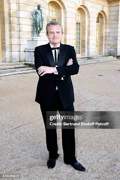 Fashion designer Jean-Charles de Castelbajac watches an incredible aerial display and fly past by the Patrouille de France in the gardens of the...