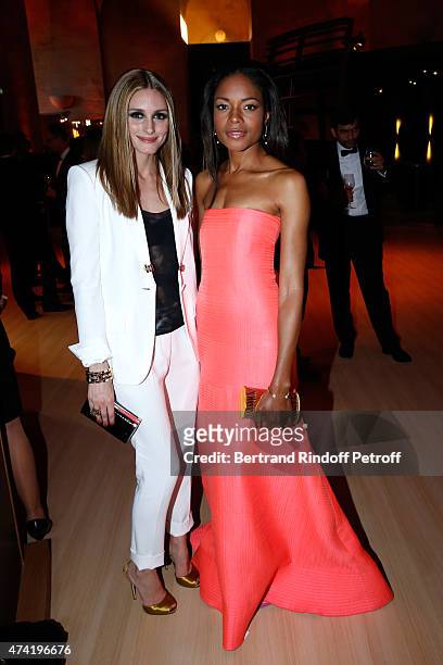 Actresses Olivia Palermo and Naomie Harris enjoy a Martell cocktail at the Martell 300th anniversary event, held at the Palace of Versailles on May...