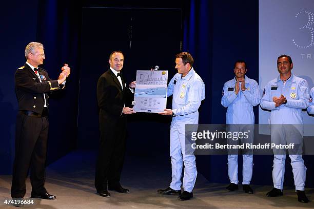 Air Force General Denis Mercier, Martell CEO and Chairman, Philippe Guettat and Pilots of the 'Patrouille de France' attend the Martell cocktail at...