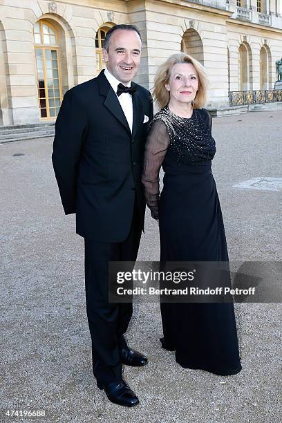 Martell CEO and Chairman, Philippe Guettat and President of the Versailles Castle, Catherine Pegard watch an incredible aerial display and fly past...