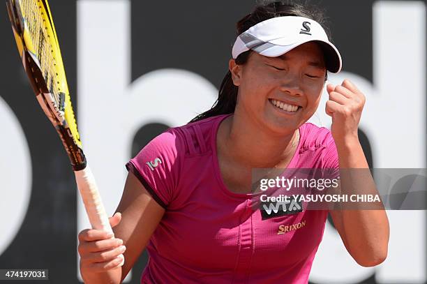 Kurumi Nara of Japan celebrates after defeating Nastassja Burnett of Italia in their 2014 Rio Open women's semi-final singles tennis match in Rio de...