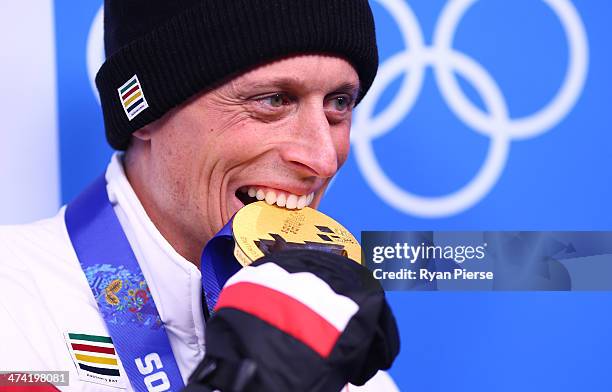 Gold medalist EJ Harnden of Canada celebrates during the medal ceremony for Men's Curling on Day 15 of the Sochi 2014 Winter Olympics at Medals Plaza...